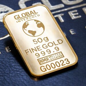 Detailed image of gold bar labeled Global Intergold on textured surface.